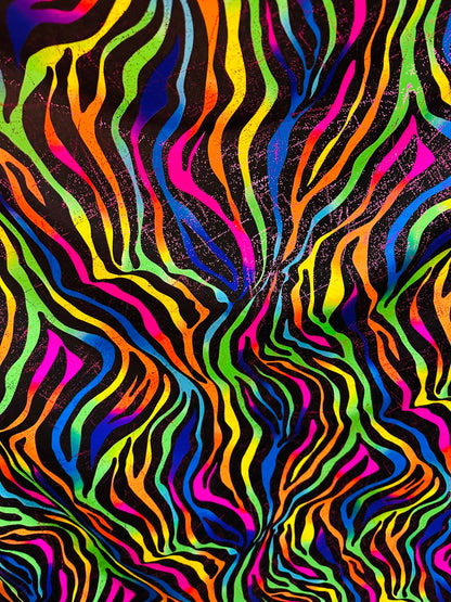 Rainbow zebra design print on nylon spandex with foil and without foil 4way stretch 58/60” Sold by the YD. Ships worldwide from Los Angeles