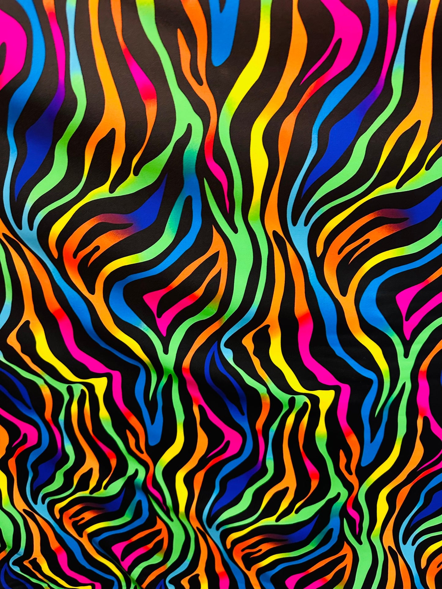 Rainbow zebra design print on nylon spandex with foil and without foil 4way stretch 58/60” Sold by the YD. Ships worldwide from Los Angeles
