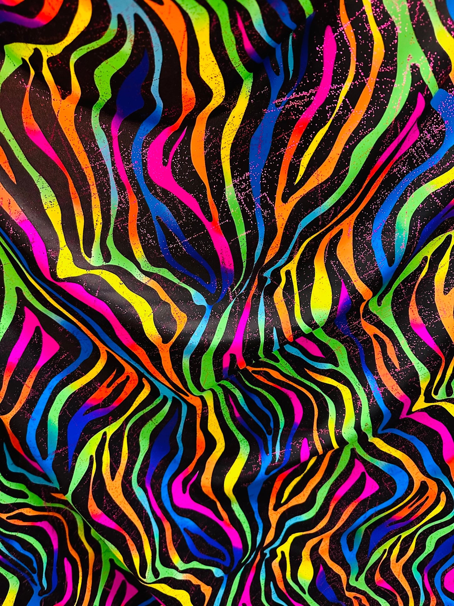 Rainbow zebra design print on nylon spandex with foil and without foil 4way stretch 58/60” Sold by the YD. Ships worldwide from Los Angeles