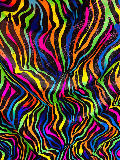 Rainbow zebra design print on nylon spandex with foil and without foil 4way stretch 58/60” Sold by the YD. Ships worldwide from Los Angeles