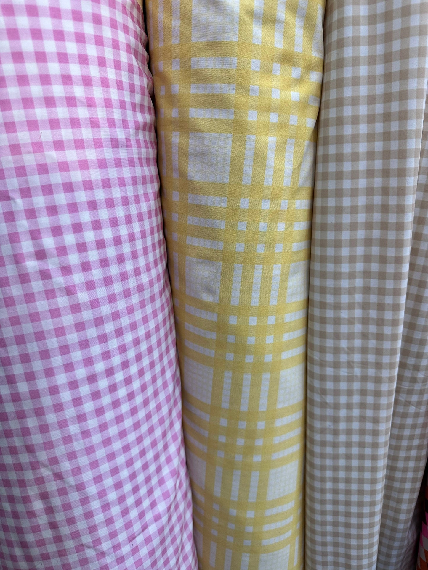 Gingham design print on great quality of nylon spandex 4-way stretch 58/60” Sold by the YD.