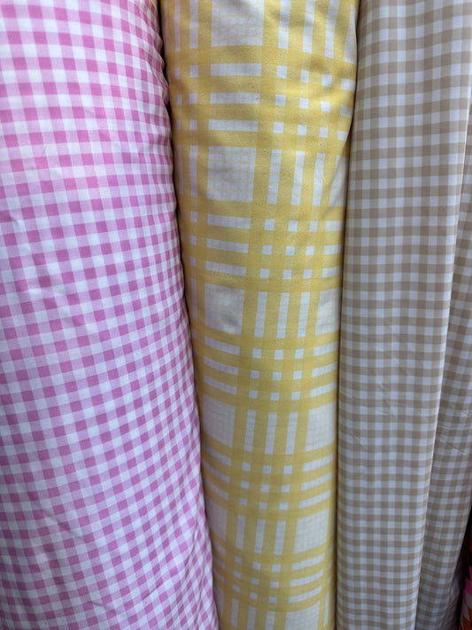 Gingham design print on great quality of nylon spandex 4-way stretch 58/60” Sold by the YD.