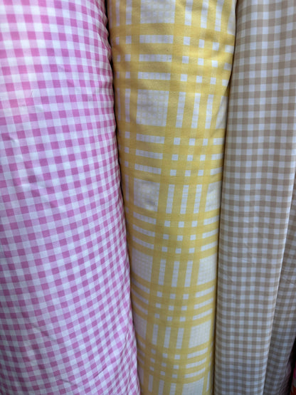 Gingham design print on great quality of nylon spandex 4-way stretch 58/60” Sold by the YD.