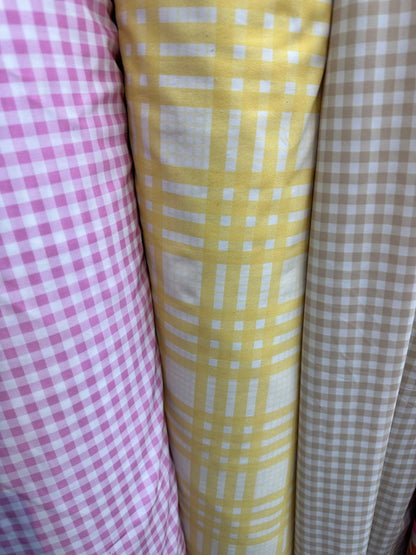 Gingham design print on great quality of nylon spandex 4-way stretch 58/60” Sold by the YD.