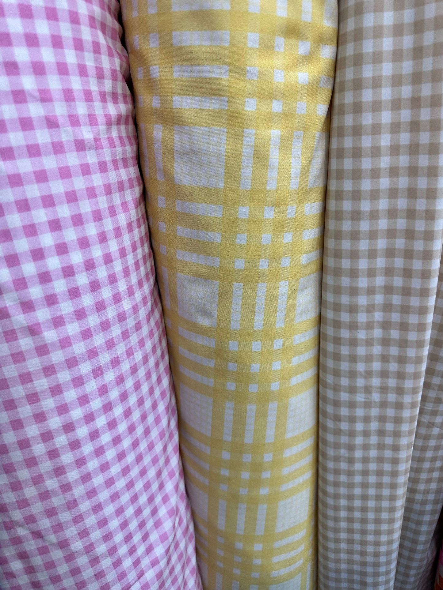 Gingham design print on great quality of nylon spandex 4-way stretch 58/60” Sold by the YD.