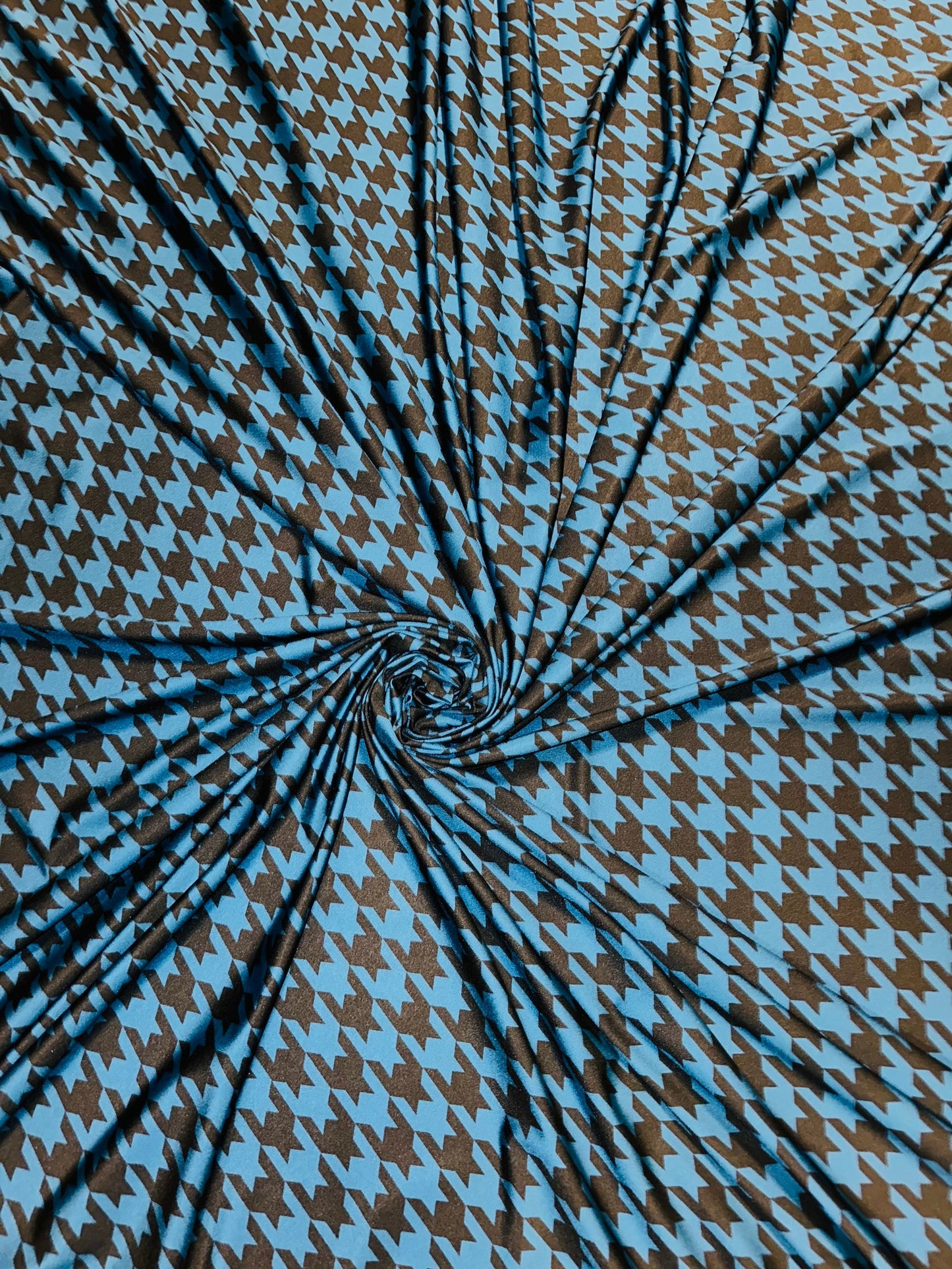 Houndstooth design print on great quality of nylon spandex 4-way stretch 58/60” Sold by the YD. Ships worldwide from L.A