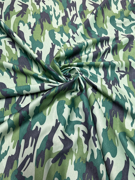 Camouflage design army green print on Poly spandex ponte de Roma 2-way stretch 58/60” Sold by the YD. Ships worldwide from Los Angeles Calif