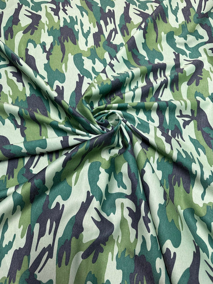 Camouflage design army green print on Poly spandex ponte de Roma 2-way stretch 58/60” Sold by the YD. Ships worldwide from Los Angeles Calif