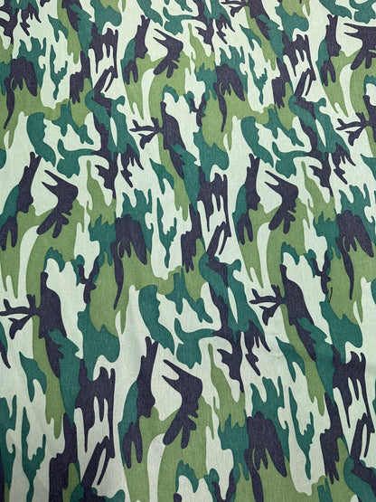 Camouflage design army green print on Poly spandex ponte de Roma 2-way stretch 58/60” Sold by the YD. Ships worldwide from Los Angeles Calif