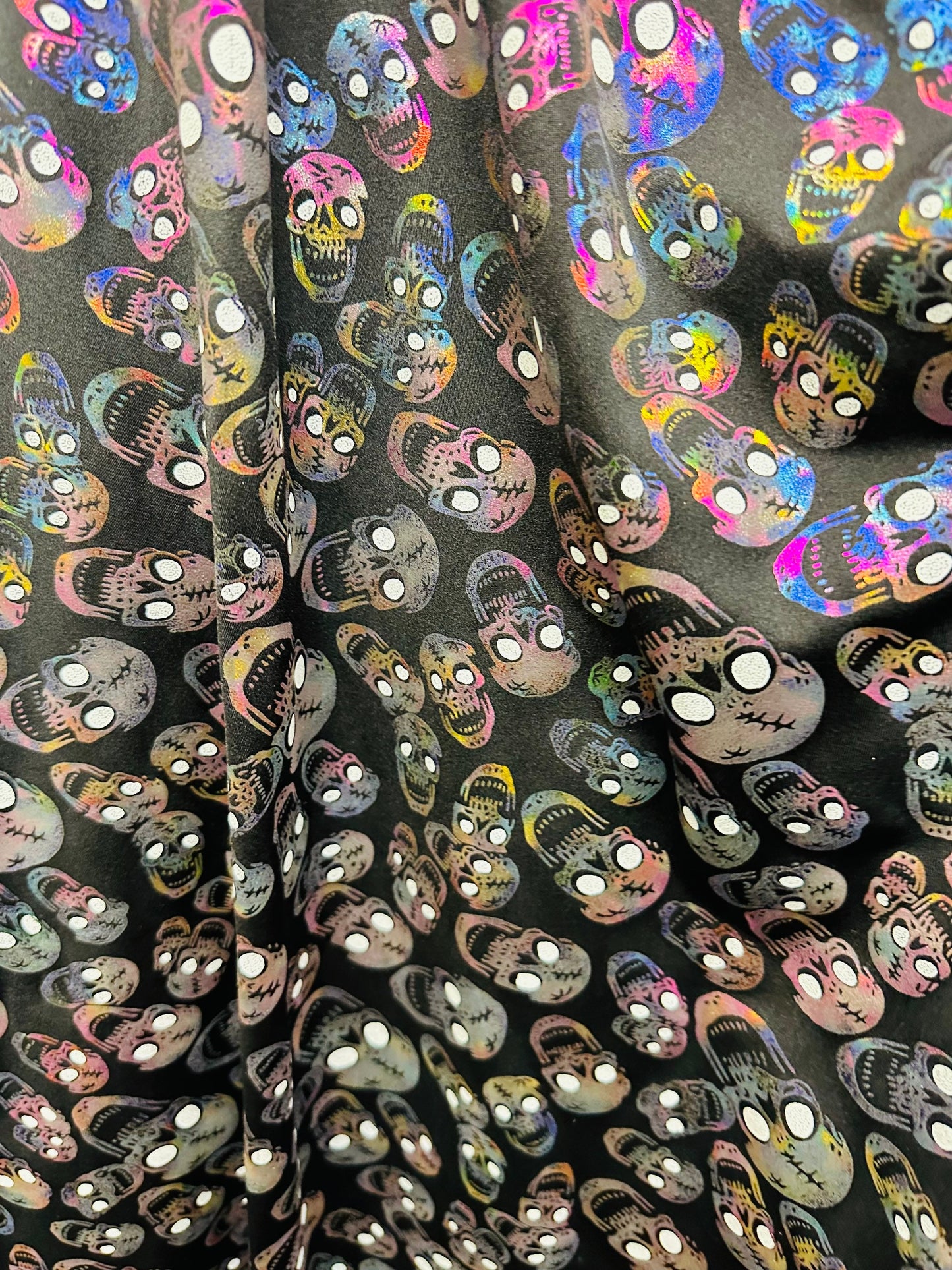New Terminator skulls design multicolor metallic nylon spandex 4-way stretch 58/60” Sold by the YD.