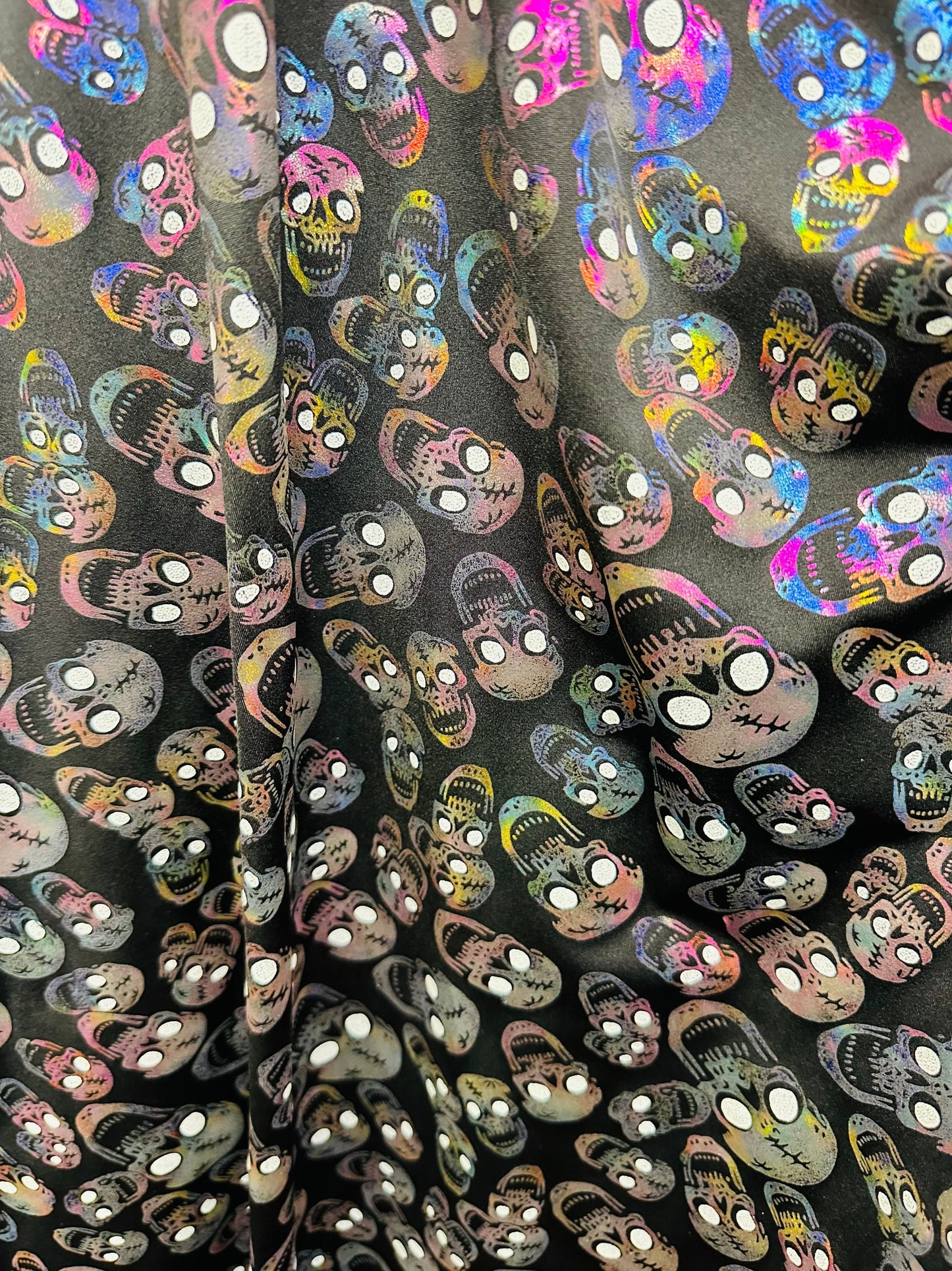 New Terminator skulls design multicolor metallic nylon spandex 4-way stretch 58/60” Sold by the YD.