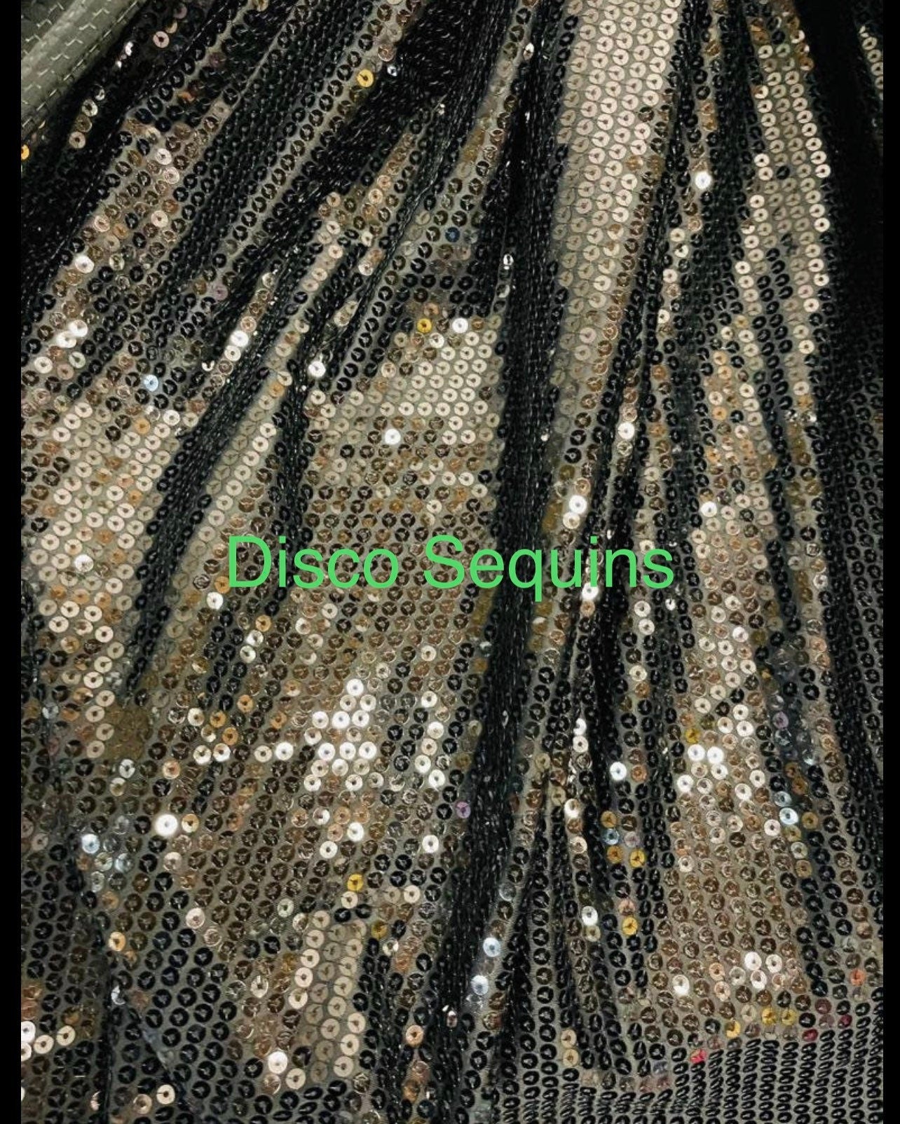 Sequins designs on stretch mesh 2-way stretch 55/57” Sold by the YD.