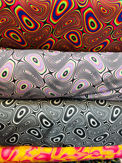 Modern Psychedelic lava design print on great quality of nylon spandex;-way stretch 58/60” Sold by the YD. Ships worldwide from L.A