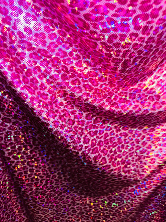 Wild Cheetah design on shattered glass hologram metallic nylon spandex 4-way stretch 58/60” Sold by the YD