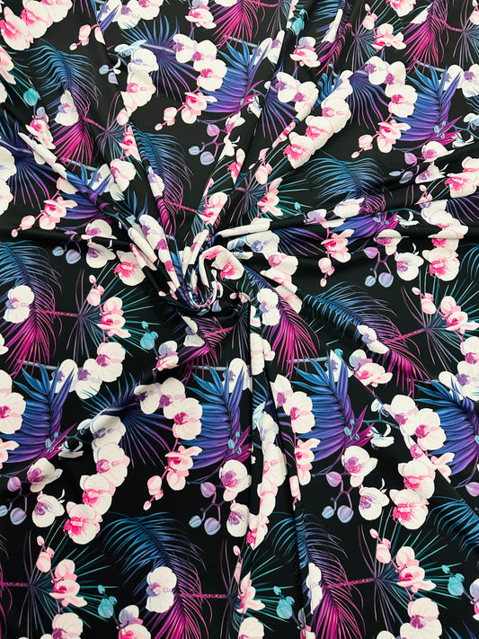 New tropical floral design print on best quality of nylon spandex 4-way stretch 58/60” Sold by the YD.