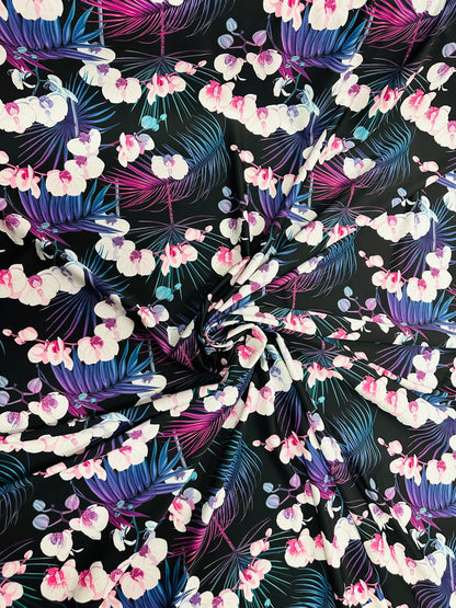 New tropical floral design print on best quality of nylon spandex 4-way stretch 58/60” Sold by the YD.
