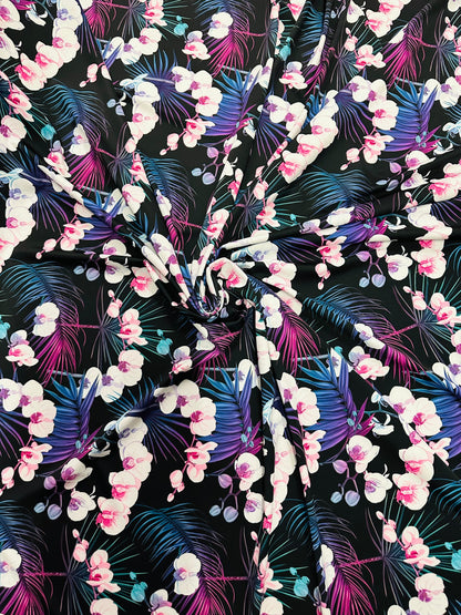New tropical floral design print on best quality of nylon spandex 4-way stretch 58/60” Sold by the YD.