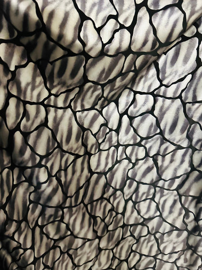 Giraffe abstract design metallic nylon spandex;-way stretch 58/60” Sold by the YD. Ships worldwide from Los Angeles California USA
