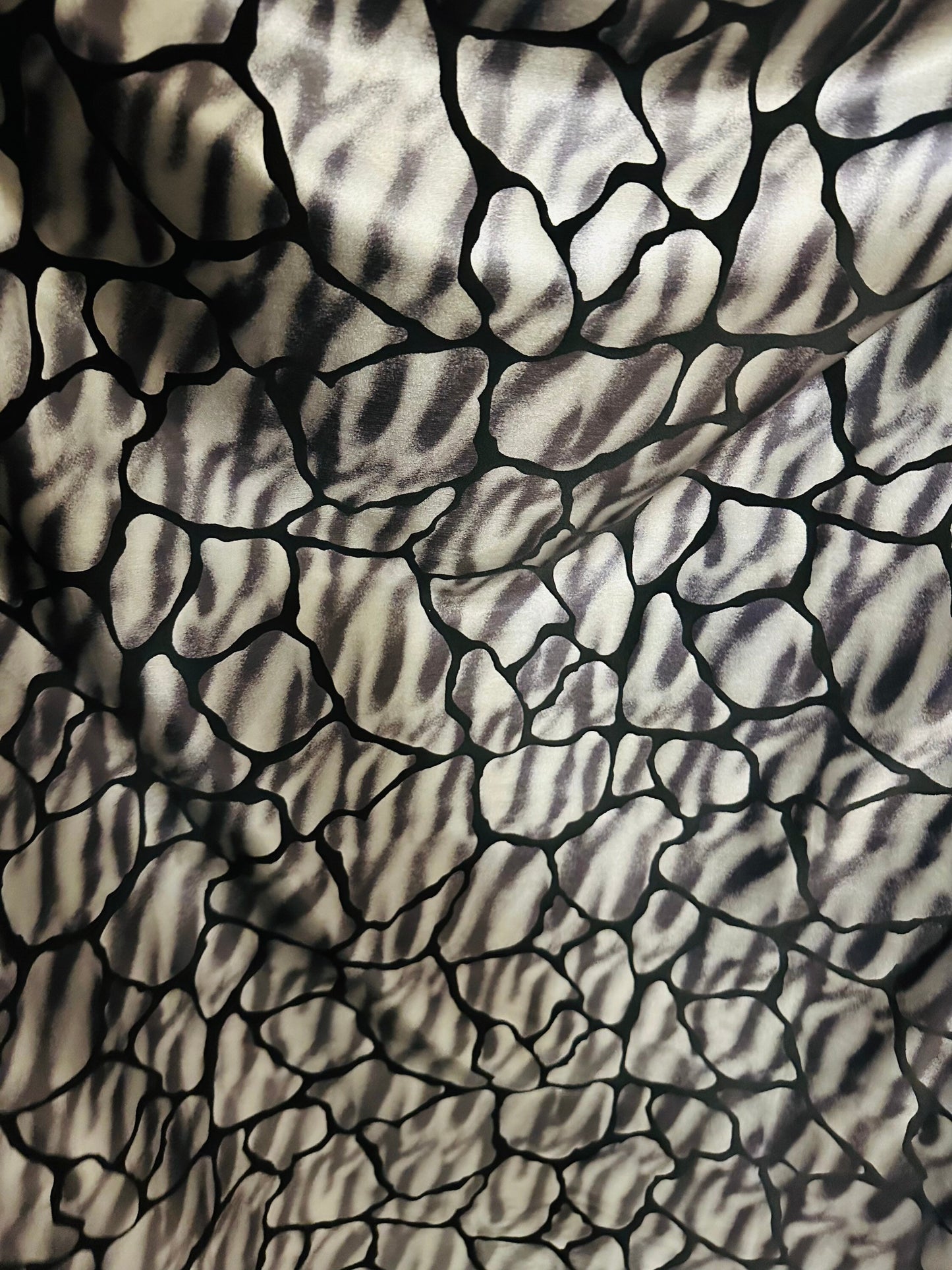 Giraffe abstract design metallic nylon spandex;-way stretch 58/60” Sold by the YD. Ships worldwide from Los Angeles California USA