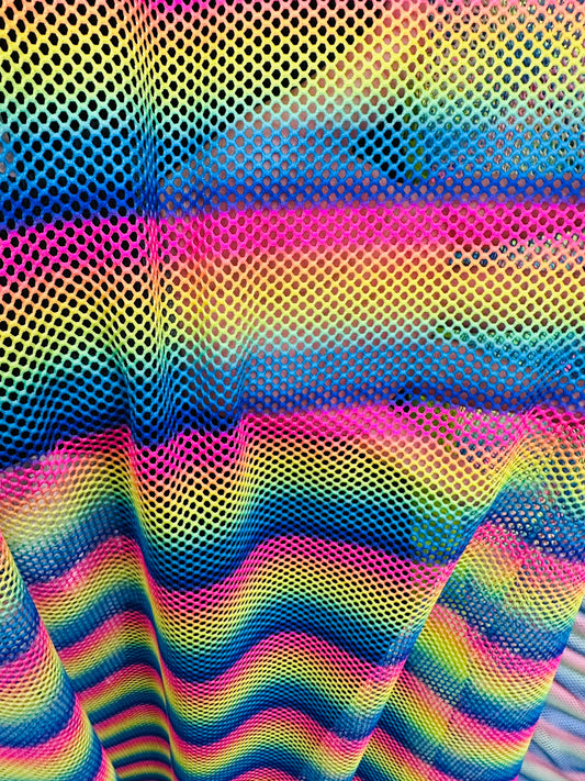 New Rainbow design print on fishnet 2-way stretch 58/60” Sold by the YD.