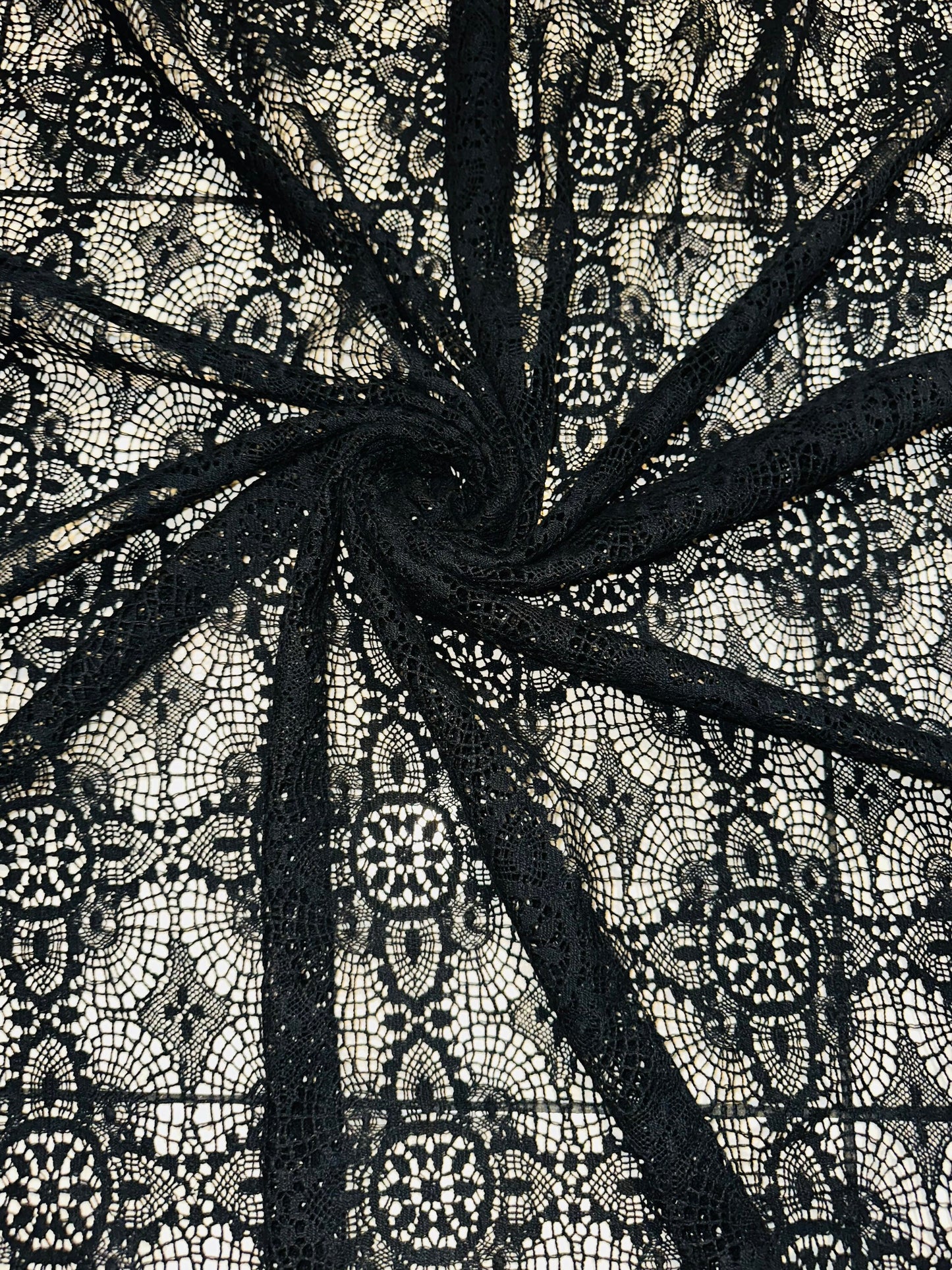 French chantilly lace, Black 36” wide, allover rose abstract design, 2 scallop edges with eyelash fringe. This is an elegant-looking lace.