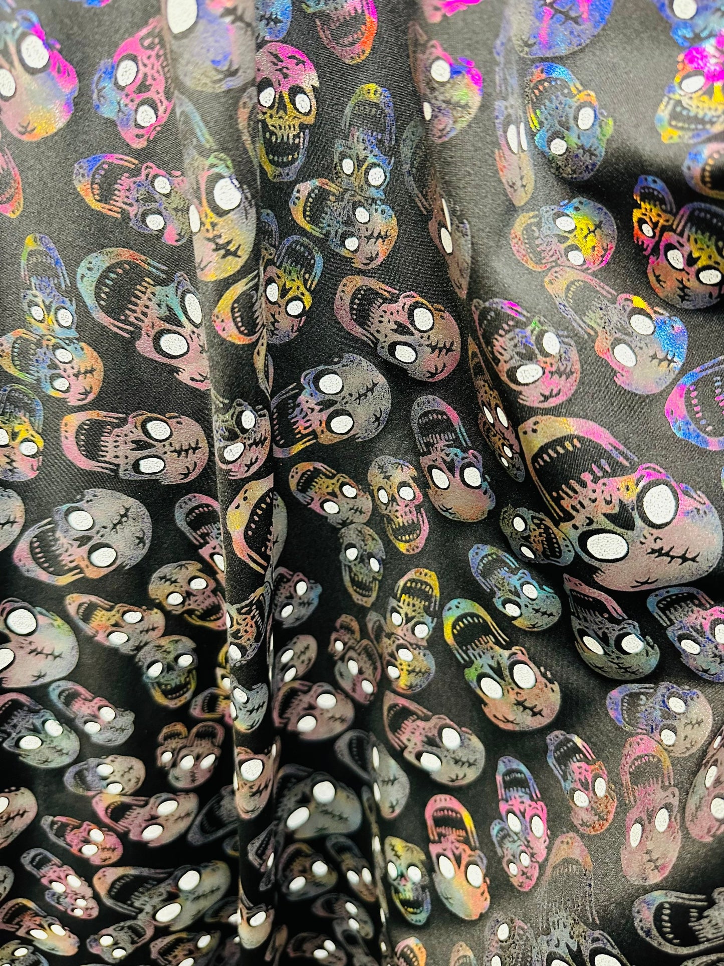 New Terminator skulls design multicolor metallic nylon spandex 4-way stretch 58/60” Sold by the YD.