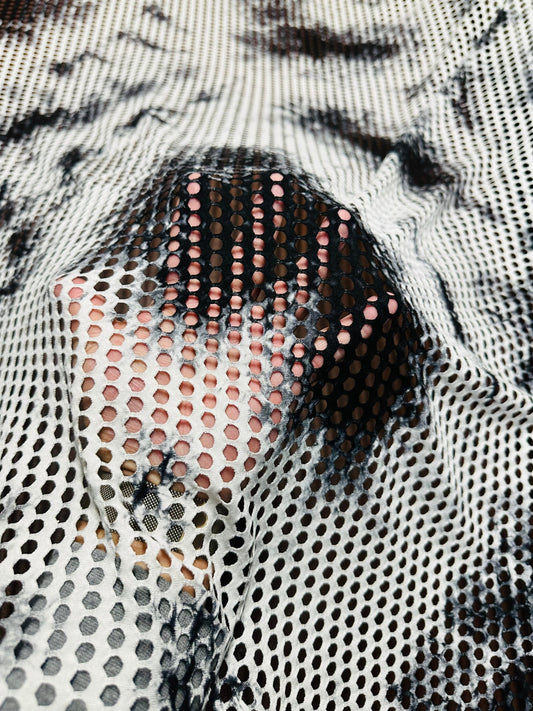 New Tye Dye fishnet white/black  nylon spandex 4-way stretch 58/60” Sold by the YD.