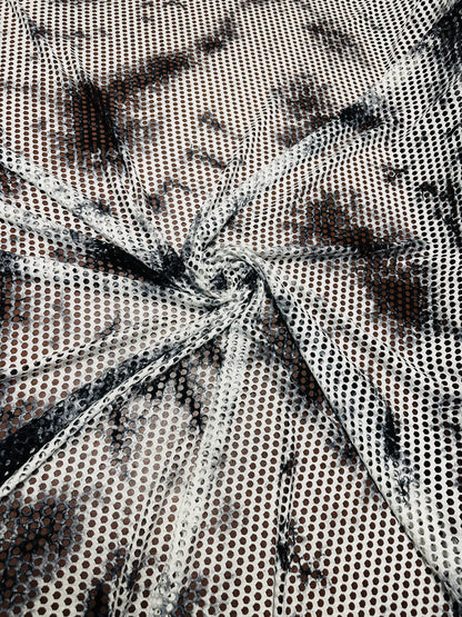 New Tye Dye fishnet white/black  nylon spandex 4-way stretch 58/60” Sold by the YD.