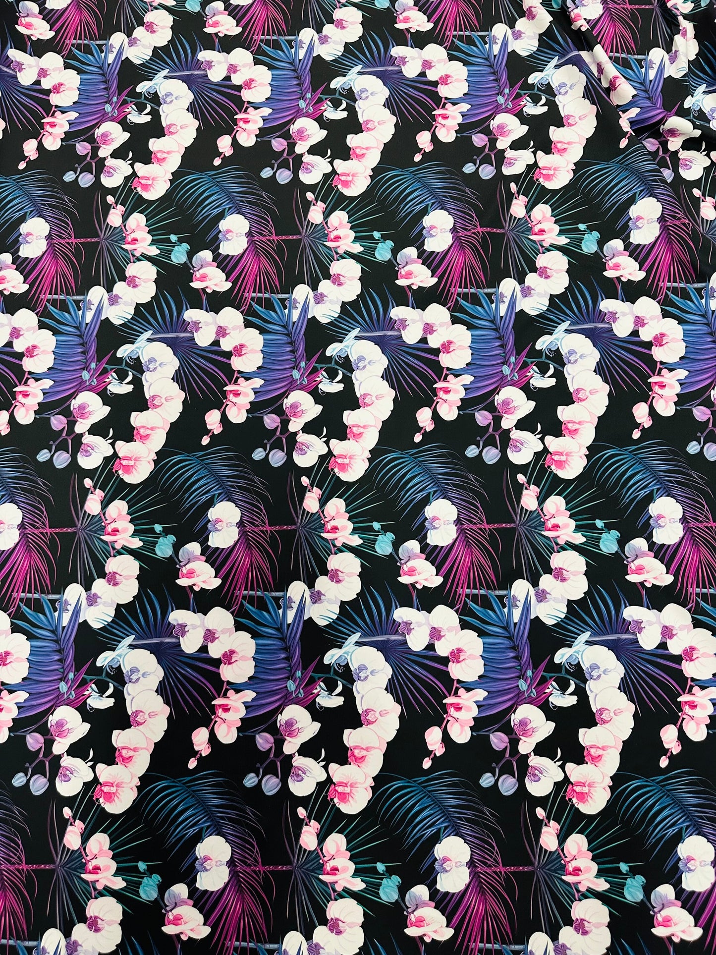 New tropical floral design print on best quality of nylon spandex 4-way stretch 58/60” Sold by the YD.