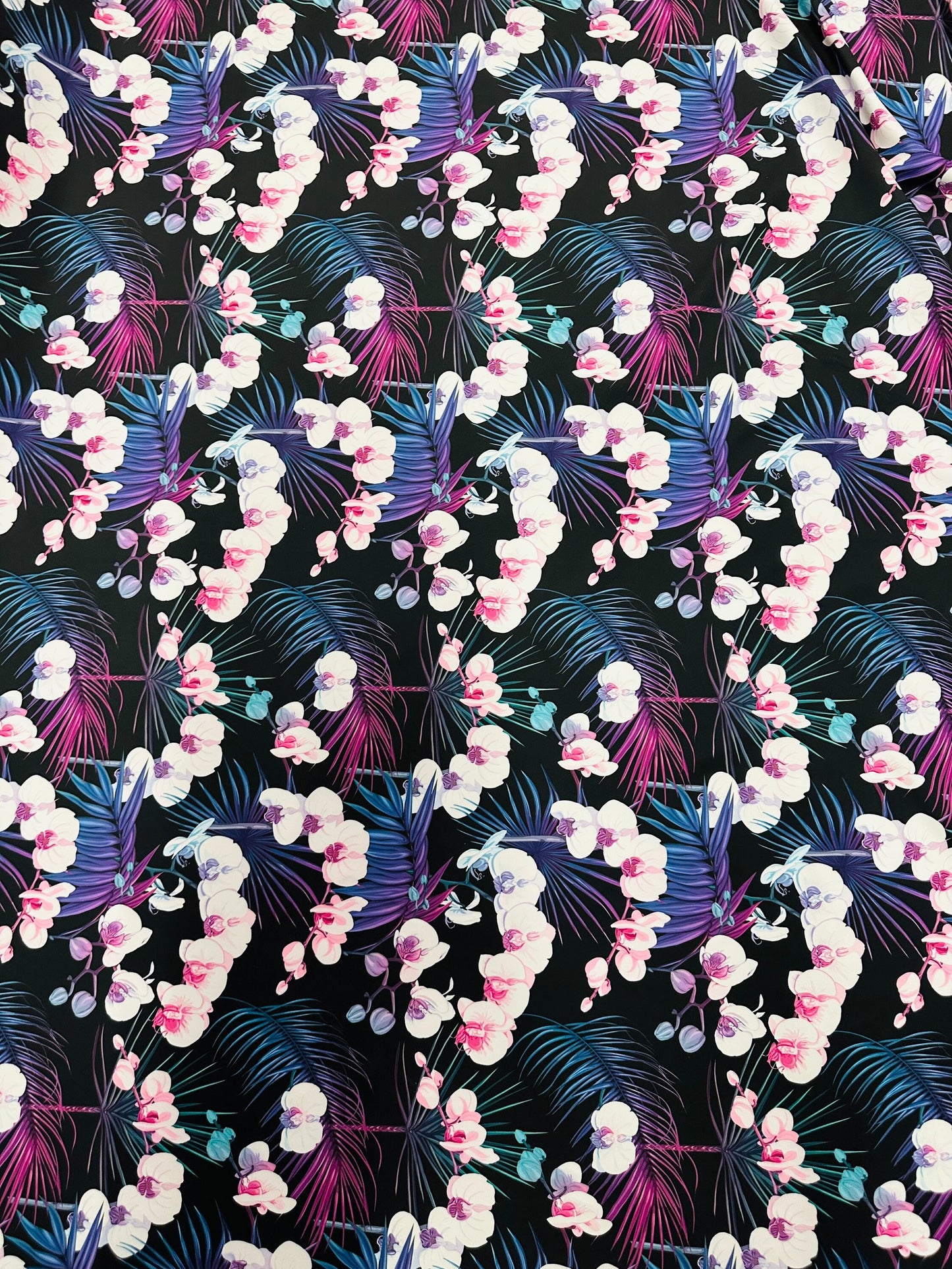 New tropical floral design print on best quality of nylon spandex 4-way stretch 58/60” Sold by the YD.