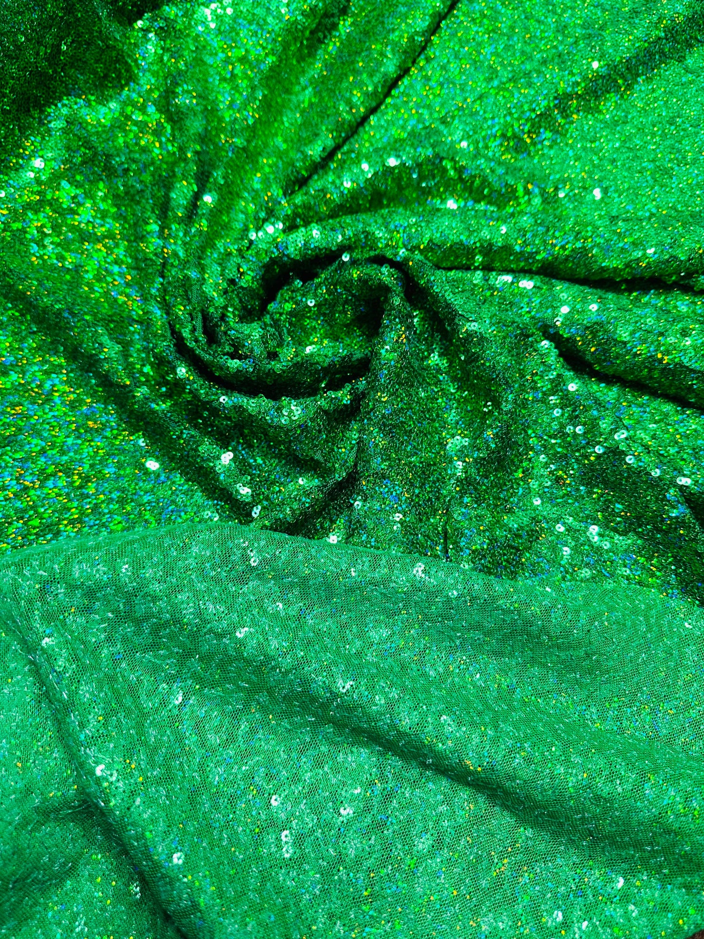 Luxury 3D hologram sequins Emerald green embroidered on power mesh 4-way stretch 54/55” Sold by the YD.