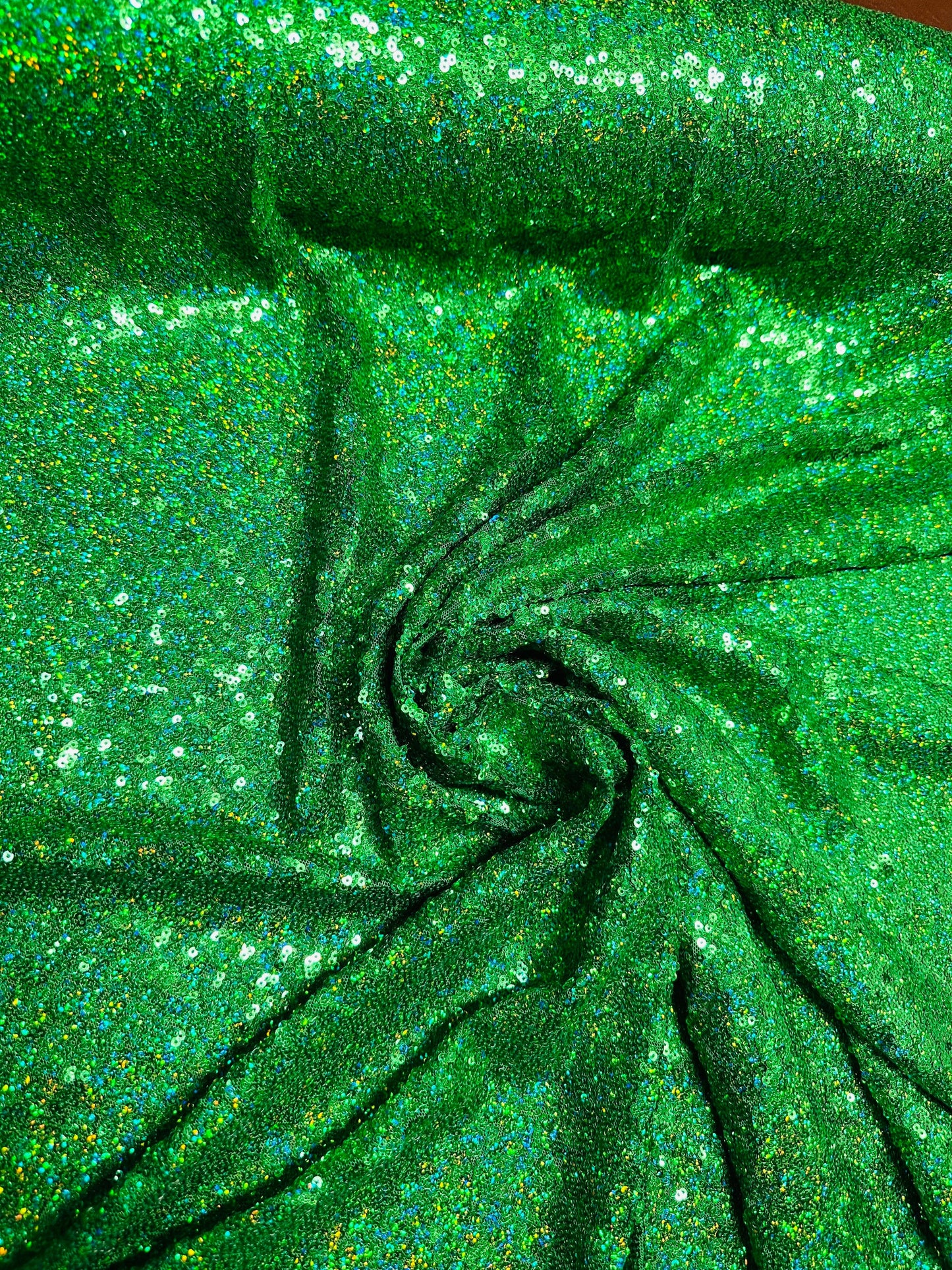 Luxury 3D hologram sequins Emerald green embroidered on power mesh 4-way stretch 54/55” Sold by the YD.