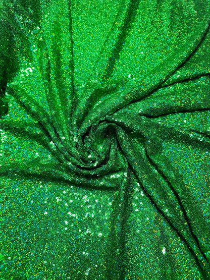 Luxury 3D hologram sequins Emerald green embroidered on power mesh 4-way stretch 54/55” Sold by the YD.