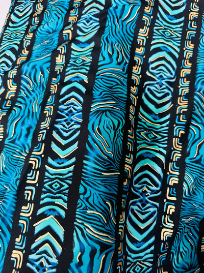 Exotic zebra design on best quality of nylon spandex with gold foil 4-way stretch 58/60” Sold by the YD.