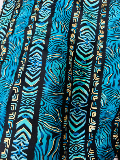 Exotic zebra design on best quality of nylon spandex with gold foil 4-way stretch 58/60” Sold by the YD.