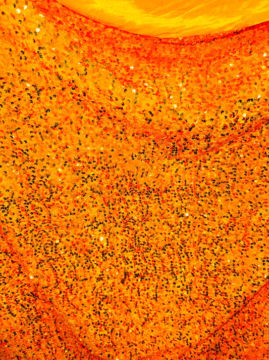Luxury Iridescent sequins neon orange embroidered on stretch velvet 4-way stretch 58/60” Sold by the YD.