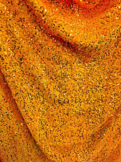 Luxury Iridescent sequins neon orange embroidered on stretch velvet 4-way stretch 58/60” Sold by the YD.
