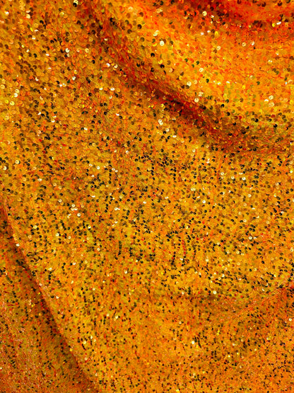 Luxury Iridescent sequins neon orange embroidered on stretch velvet 4-way stretch 58/60” Sold by the YD.