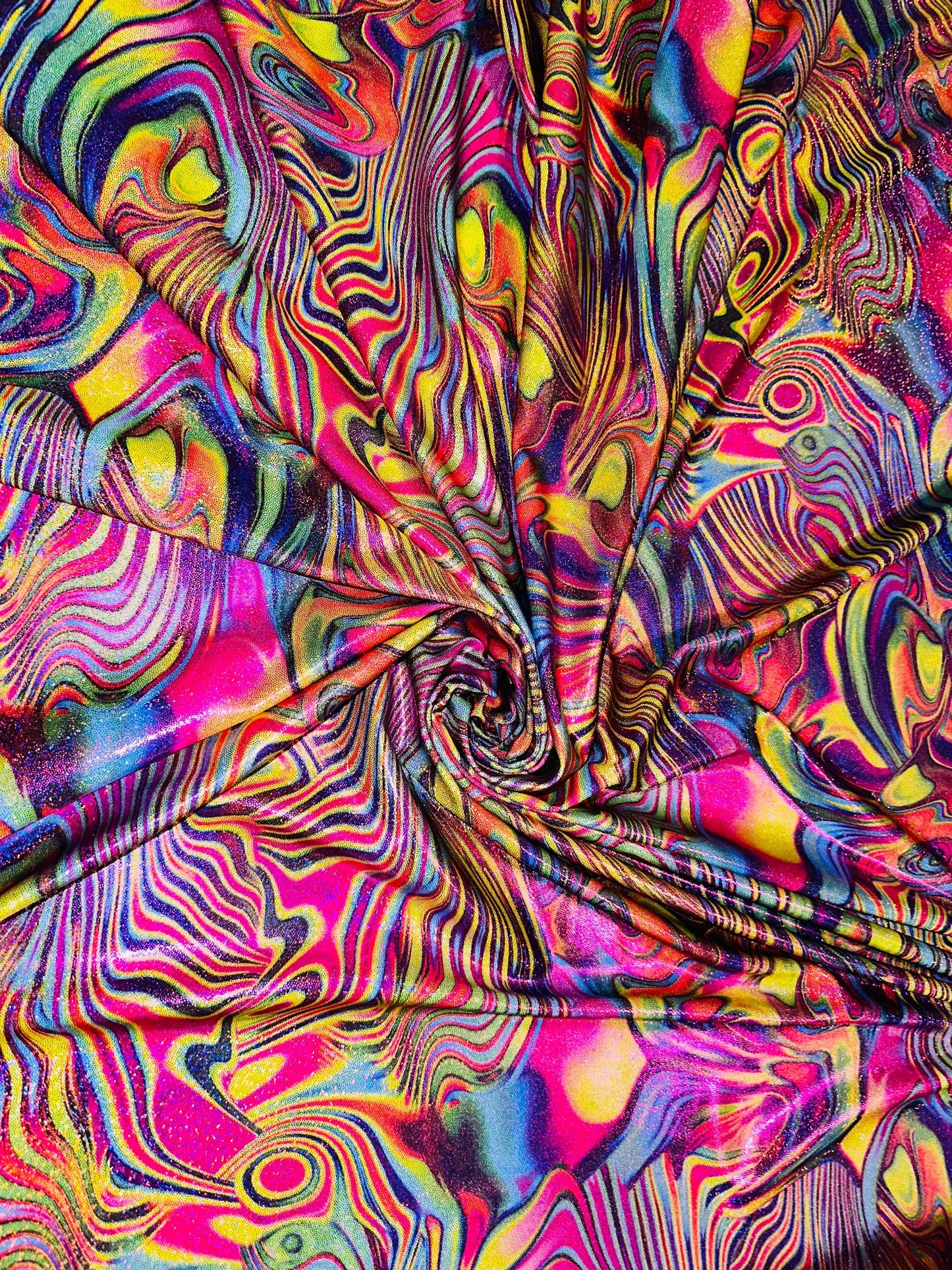 Metallic hologram swirl abstract design print on best quality of nylon spandex 4-way stretch 58/60” Sold by the YD.