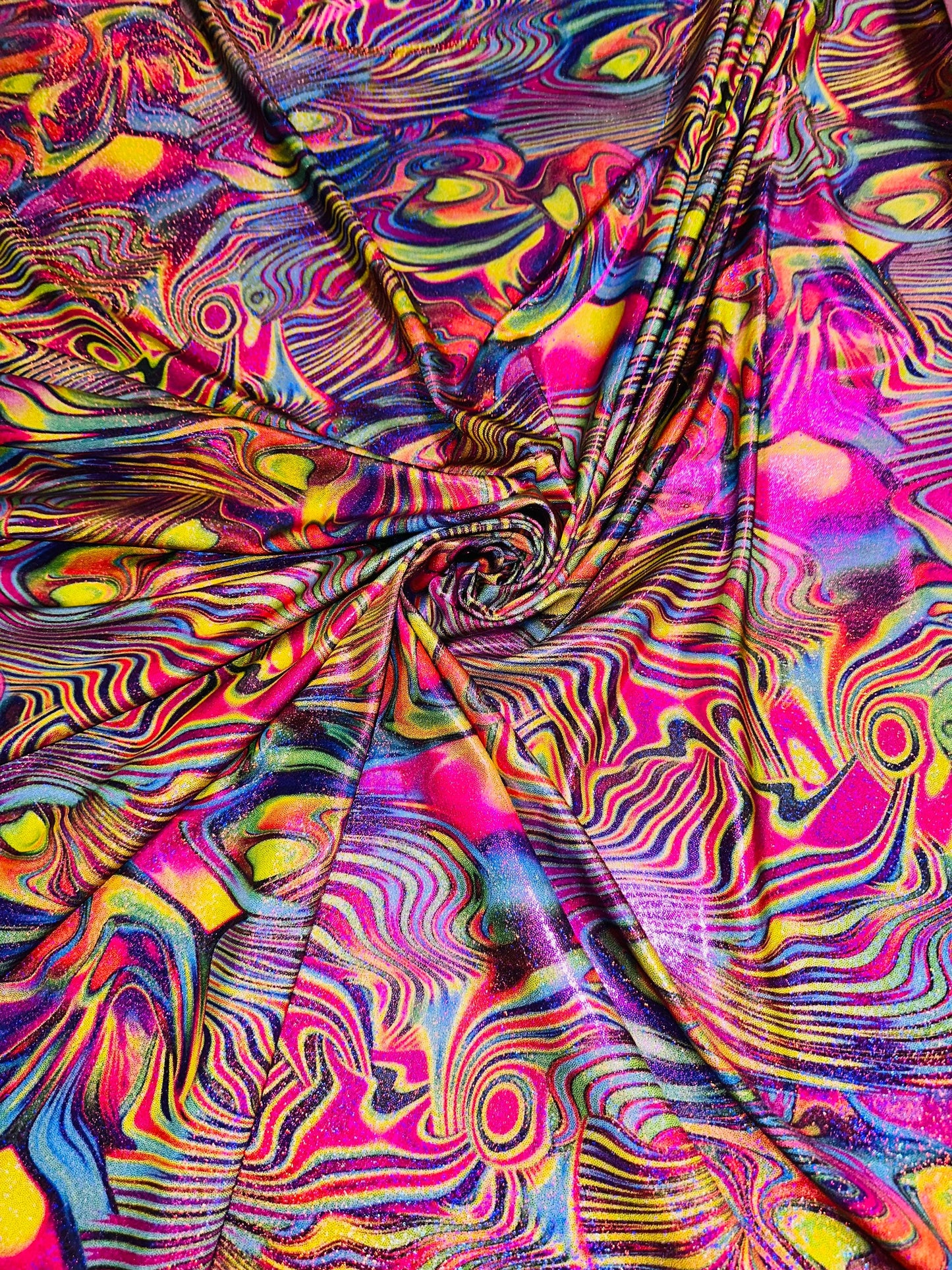 Metallic hologram swirl abstract design print on best quality of nylon spandex 4-way stretch 58/60” Sold by the YD.