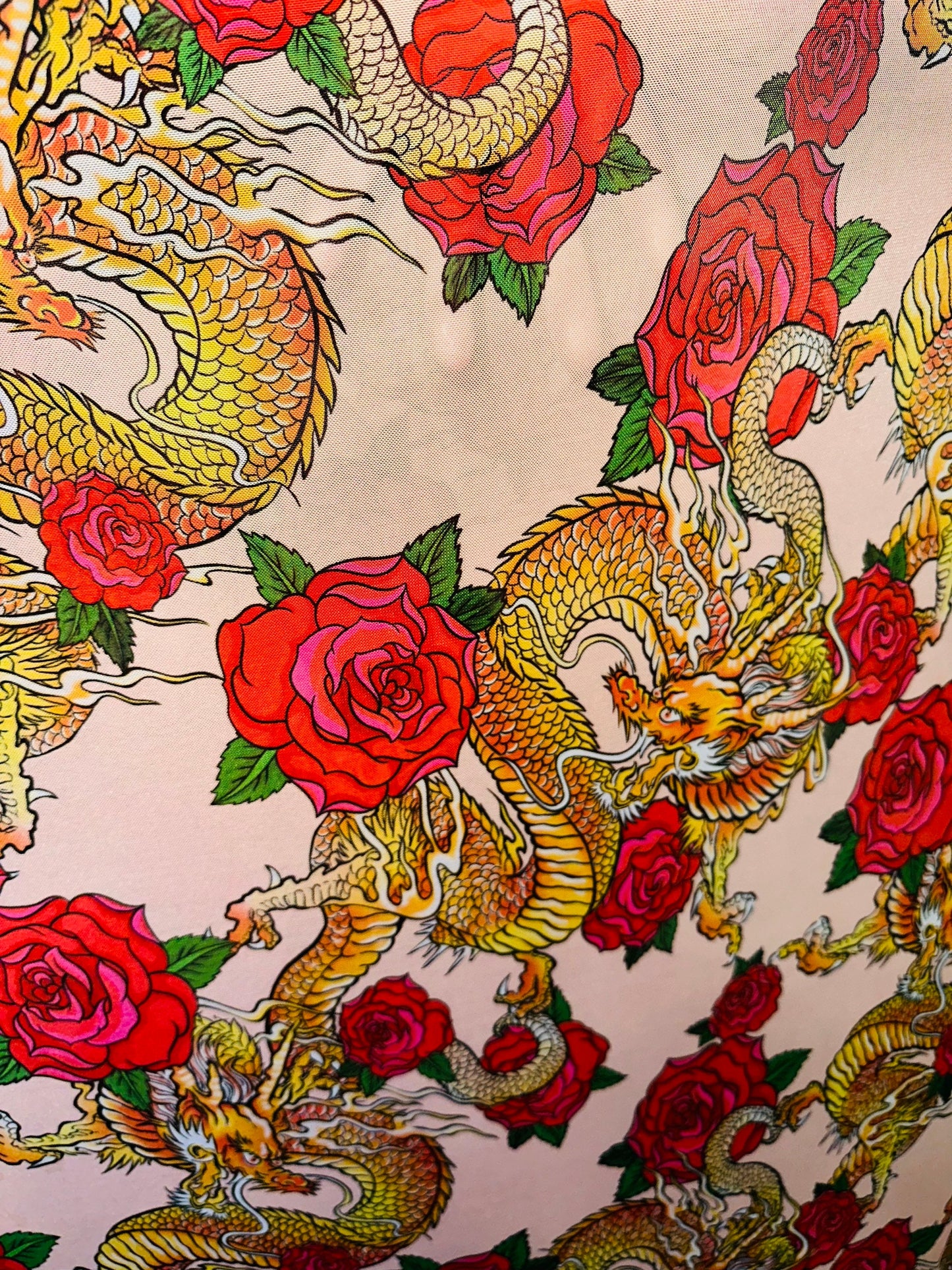 New Exotic Dragon design with red Roses print on power mesh 4-way stretch 58/60” Sold by the YD. Ships Worldwide from Los Angeles