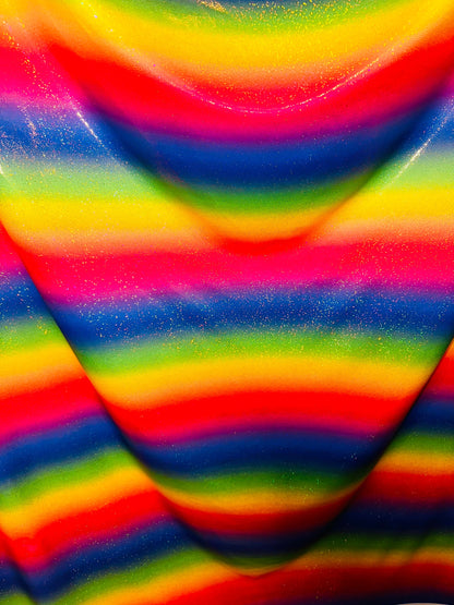 Rainbow design hologram metallic nylon spandex 4-way stretch 58/60” Sold by the YD. Ships worldwide from Los Angeles California USA