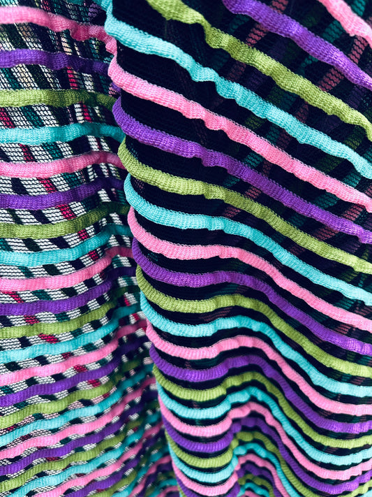 New Ruffle design stretch mesh Black/multicolor 2-way stretch 58/60” Sold by the YD. Ships worldwide from Los Angeles California USA