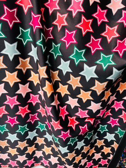 New Stars freedom design black/multicolor print on great quality of nylon spandex 4-way stretch 58/60” Sold by the YD