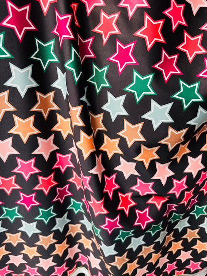 New Stars freedom design black/multicolor print on great quality of nylon spandex 4-way stretch 58/60” Sold by the YD