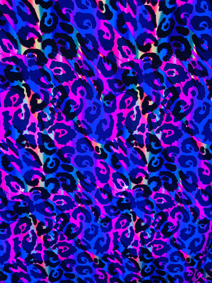 Wildcat  design multicolor print on best quality of nylon spandex 4-way stretch UV light it glows under black light 58/60” Sold by the YD.