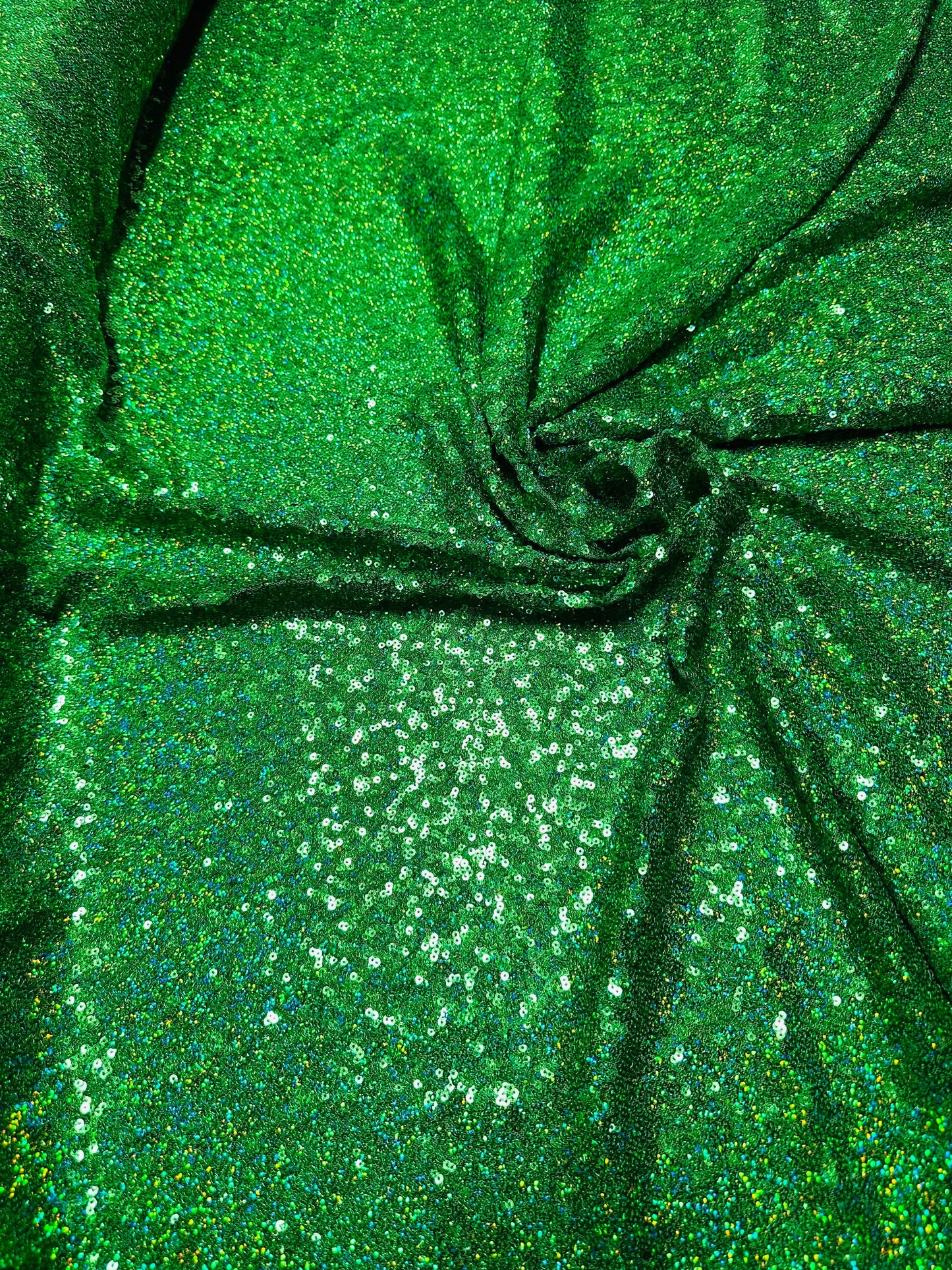 Luxury 3D hologram sequins Emerald green embroidered on power mesh 4-way stretch 54/55” Sold by the YD.
