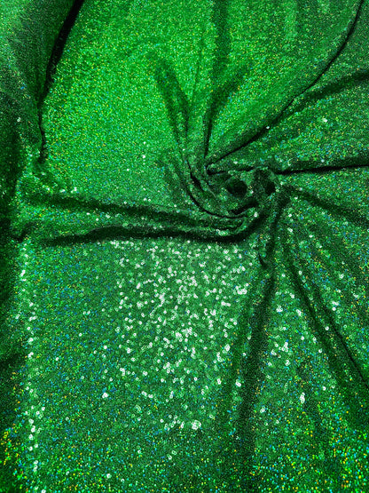 Luxury 3D hologram sequins Emerald green embroidered on power mesh 4-way stretch 54/55” Sold by the YD.