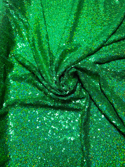 Luxury 3D hologram sequins Emerald green embroidered on power mesh 4-way stretch 54/55” Sold by the YD.