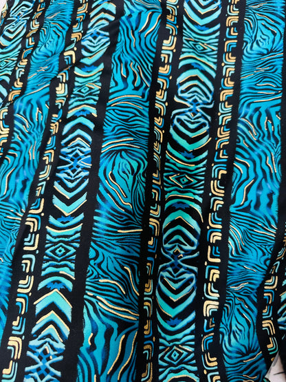 Exotic zebra design on best quality of nylon spandex with gold foil 4-way stretch 58/60” Sold by the YD.